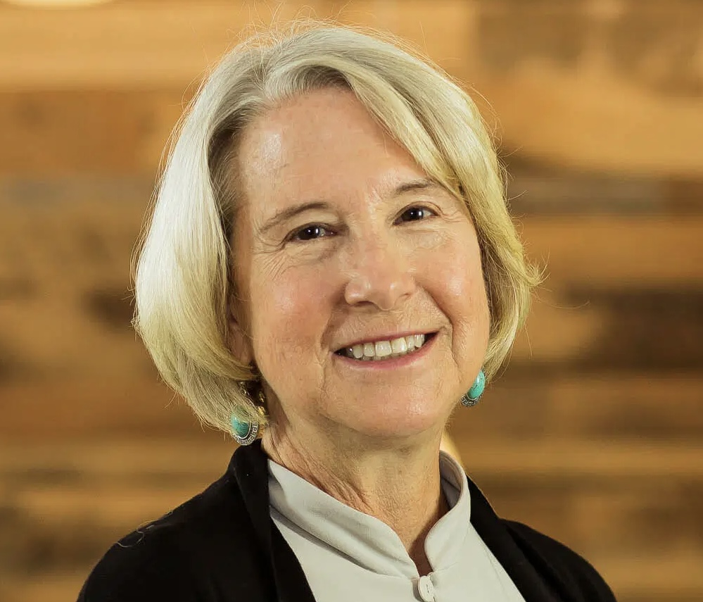 A headshot of Carrie Hessler-Radelet