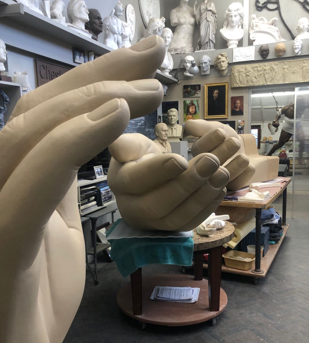 An image of the 2/3-scale models for the Peace Corps Park benches, shown in the sculptor's studio